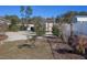 Landscaped backyard with shed and concrete patio at 2775 Sw 158Th St, Ocala, FL 34473