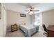 Bedroom with double bed, window, and desk at 2775 Sw 158Th St, Ocala, FL 34473