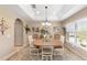 Bright dining room with a round table and coastal decor at 2775 Sw 158Th St, Ocala, FL 34473