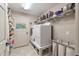 Laundry room with washer, dryer, and ample storage at 2775 Sw 158Th St, Ocala, FL 34473