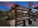 Pergola with string lights and seating area at 2775 Sw 158Th St, Ocala, FL 34473