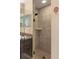 Large walk-in shower with neutral tile and corner shelf at 2775 Sw 158Th St, Ocala, FL 34473