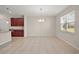 Dining room with tile floors and a chandelier at 29567 Caspian St, Leesburg, FL 34748