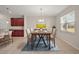 Bright dining room features a wood table and neutral decor at 29567 Caspian St, Leesburg, FL 34748