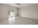 Spacious living room with sliding doors to patio at 29567 Caspian St, Leesburg, FL 34748