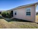 Exterior view showcasing the home's siding and landscaping at 3144 Blackstock Way, The Villages, FL 32163