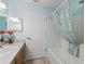 Bathroom with a tub and shower at 353 Ranchwood Dr, Leesburg, FL 34748