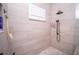 Modern bathroom with double vanity and large shower at 41516 Saddle Ridge Ln, Weirsdale, FL 32195