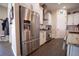 Stainless steel refrigerator in a spacious kitchen at 41516 Saddle Ridge Ln, Weirsdale, FL 32195