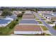 Aerial view of a neighborhood featuring neatly arranged homes and well-maintained landscaping at 424 Rose Croft Ter, The Villages, FL 32162