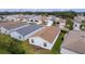 Rear view of house showing roofline and neighborhood context at 424 Rose Croft Ter, The Villages, FL 32162