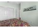 Bright bedroom with double doors leading to another room at 424 Rose Croft Ter, The Villages, FL 32162