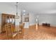 Open floor plan showcasing dining table, living room and kitchen at 424 Rose Croft Ter, The Villages, FL 32162