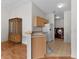 Kitchen featuring stainless steel appliances and a view into the laundry room at 424 Rose Croft Ter, The Villages, FL 32162