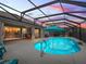 Enjoy the sunset from this relaxing pool and covered patio area at 4406 Creighton Loop, The Villages, FL 32163