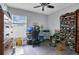 Home office with a desk, chair, and built-in shelving at 4518 Hummingbird Ln, Haines City, FL 33844