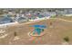 Community playground with slides and shade structures at 4518 Hummingbird Ln, Haines City, FL 33844