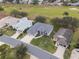 Aerial view highlighting home's location and landscape at 4928 Kelso St, Leesburg, FL 34748