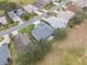 Aerial view of property and surrounding homes at 4928 Kelso St, Leesburg, FL 34748