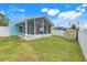 Large backyard with screened porch and storage shed at 500 Southern Charm Dr, Orlando, FL 32807