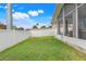 Nice backyard with grassy area and privacy fence at 500 Southern Charm Dr, Orlando, FL 32807