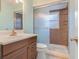 Clean bathroom with a shower and updated vanity at 500 Southern Charm Dr, Orlando, FL 32807