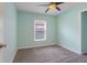 Light and airy bedroom with a window and new flooring at 500 Southern Charm Dr, Orlando, FL 32807