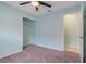 Bedroom with ceiling fan and walk-in closet at 500 Southern Charm Dr, Orlando, FL 32807