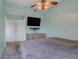 Bright bedroom with a ceiling fan and built-in dresser at 500 Southern Charm Dr, Orlando, FL 32807