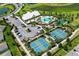 Resort-style amenities including pool, pickleball, and tennis courts at 5278 Dragonfly Dr, Wildwood, FL 34785