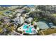 Aerial view of community amenities including pool and tennis courts at 5318 Fantasy Way, Leesburg, FL 34748