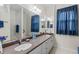 Double vanity bathroom with blue accents at 5318 Fantasy Way, Leesburg, FL 34748