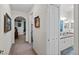 Hallway with access to bathroom and bedroom at 5318 Fantasy Way, Leesburg, FL 34748