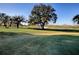 Picturesque golf course view with lush greens at 581 Society Hill Cir, The Villages, FL 32162