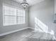 Light-filled dining room with hardwood floors and large window at 808 E Orange St, Apopka, FL 32703