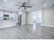 Modern kitchen with white cabinets and stainless steel appliances at 808 E Orange St, Apopka, FL 32703