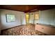 An older home's interior room with tiled floor and unique architectural details at 819 Edgewater Dr, Eustis, FL 32726