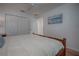 King-size bed in bright bedroom with ocean art at 963 Hart Dr, The Villages, FL 32163