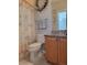 Charming bathroom with a shower/tub combo and updated vanity at 97 Bayou Bend Rd, Groveland, FL 34736