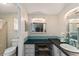 Bathroom with a vanity, large mirror and shower at 1007 Dustin Dr, The Villages, FL 32159