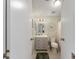 Bathroom with a modern vanity and shower/tub combo at 1007 Dustin Dr, The Villages, FL 32159