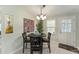 Cozy dining area with seating for four at 1007 Dustin Dr, The Villages, FL 32159