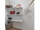 Spacious closet with shelves for shoes and handbags at 102 Camino Real Blvd # 102, Howey In The Hills, FL 34737