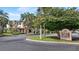 Community clubhouse with signage for various amenities at 102 Camino Real Blvd # 102, Howey In The Hills, FL 34737