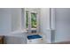 Elegant entryway with French doors leading to the backyard at 102 Camino Real Blvd # 102, Howey In The Hills, FL 34737