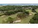 Beautiful golf course and surrounding landscape with water views and lush trees at the Mission Inn Resort & Club at 102 Camino Real Blvd # 102, Howey In The Hills, FL 34737