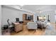 Home office with built-in shelving, hardwood floors, and a desk at 102 Camino Real Blvd # 102, Howey In The Hills, FL 34737