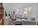 Spacious living room with light walls and comfortable seating at 102 Camino Real Blvd # 102, Howey In The Hills, FL 34737