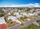 Aerial view of a large mobile home community near the lake at 1026 Capella Dr, Tavares, FL 32778