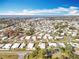 Aerial view of a large mobile home community near the lake at 1026 Capella Dr, Tavares, FL 32778